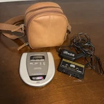 Lenox Sound CD-79 Portable Compact Disc Player W/ Car Stereo Adapter & Case. Fixed Price $18.99.